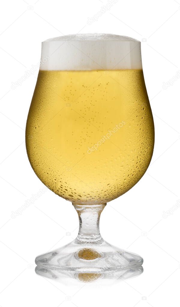 Isolated image of a refreshing glass of lager, in a schooner glass, with condensation