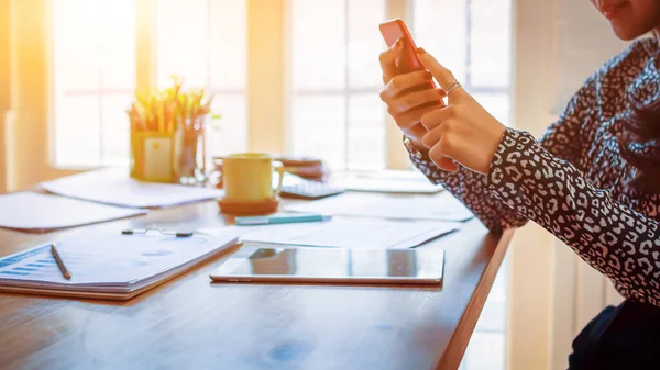 A woman built a room in the house to use as an office for work at home, according to government policies to prevent infection and spread the disease during the coronavirus covid-19 outbreak.