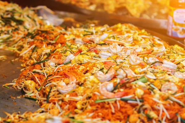 Blurred images of Pad Thai menu,Pad Thai is a ready-to-eat food that is popular on the Walking Street or Street Food in Thailand because Pad Thai is easy to carry and easy to eat when walking.