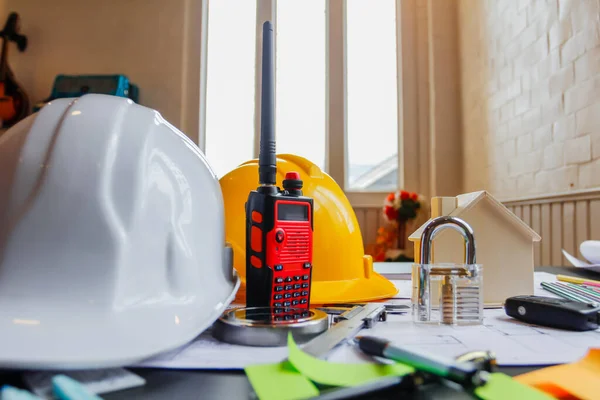 Soft Focus,The contractor has prepared a helmet to wear before entering the construction area. Safety helmets are a safety protection device in construction sites for professional construction workers