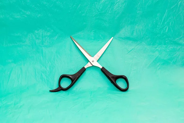 Open Scissors Black Handles Turquoise Background Close — Stock Photo, Image
