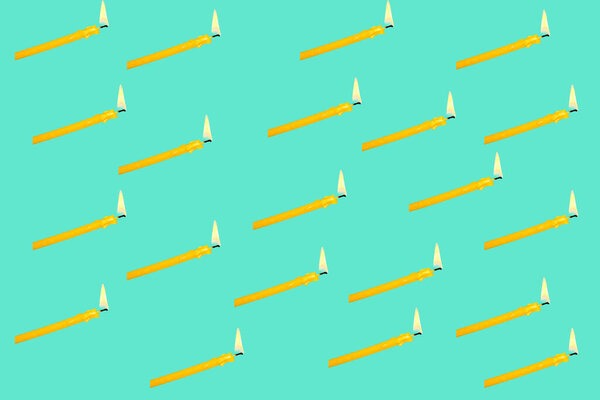 Pattern with a burning candle on a blue background. Prints and ornaments.