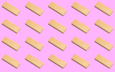 Pembe arka planda waffle deseni. Kalıplar, izler.