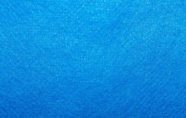 Kumaş arka plan parlak mavi bir renktir. Doku.