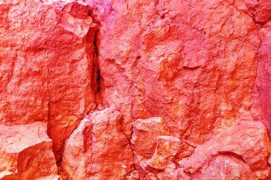 Mercan kırmızı grunge dokulu duvar arka plan, doğal kaya yüzeyi