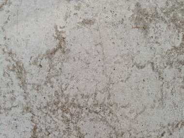 Lekeli ve yıpranmış dokusu olan sert beton duvarı kapatın. Yüksek kalite fotoğraf