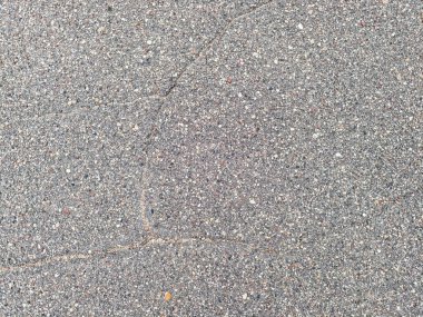 Kırık asfalt asfalt yüzeyini pürüzlü dokuyla kapatın. Yüksek kalite fotoğraf