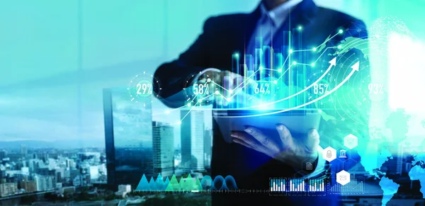 Digital marketing. Business strategy. Businessman using tablet analyzing sales data and economic growth graph chart on hologram screen. — Stock Photo, Image