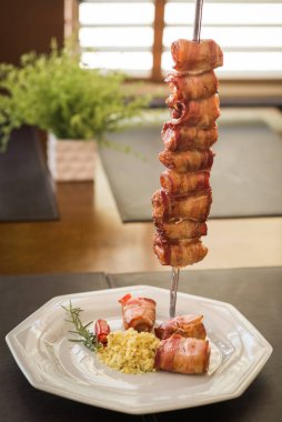 madalyon, domuz pastırması ve churrascaria 'da servis edilen domuz pastırması.