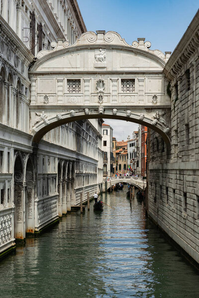 View of the Bridge of Sighs (Ponte dei Sospiri) Canals of Venice during the day in high resolution, vertical orientation