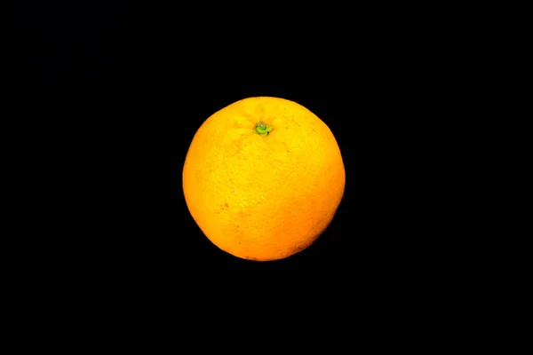 Přírodní Oranžová Černým Pozadím — Stock fotografie
