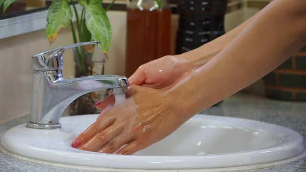 sanitized new normal, wash hands with soap in the sinks, cleaning to prevent the spread of coronavirus.