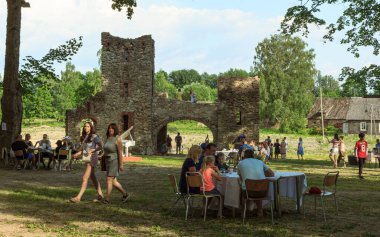 Kurmene, Latvia - June 28, 2020: The Kurmene Manor park is arranged as a landscape park with individual elements clipart