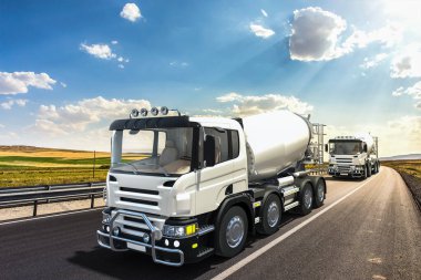 Beton karıştırıcı kamyonlar yolda.