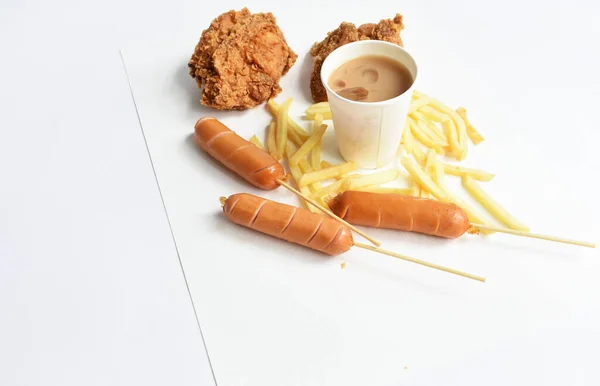 Tasty, delicious breakfast table, dish of sweet croissant, friend chicken, Korean sesame Mochi bread or Japanese Mochi bun, pig sausage, milk coffee paper cup, white background, junk food, fast food