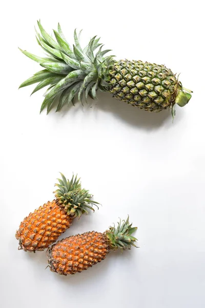Green Pineapple Orange Pineapples Isolated Bright Yellow Background Fresh Tropical — Stock Photo, Image