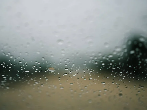 Rain drops on the glass during the heavy rains in the rainy season.