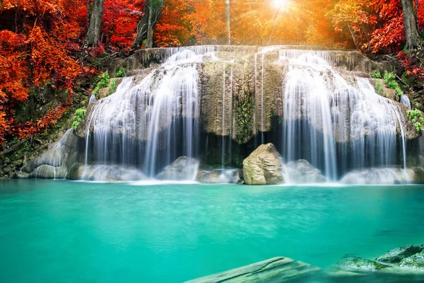 Amazing in nature, beautiful waterfall at colorful autumn forest in fall season 