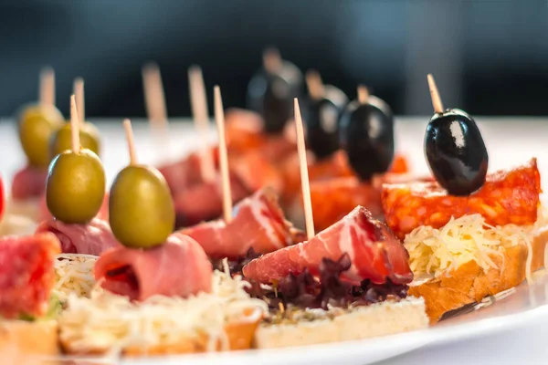 Delicious Canapes Salami Ham Olives Cheese Spices Stock Picture