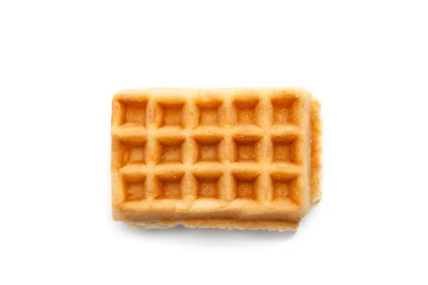 Beyaz zemin üzerinde fırınlanmış waffle, üst görünüm.