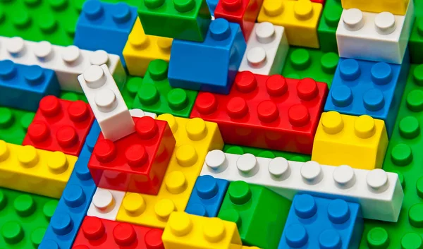 Plastic toy blocks on white background