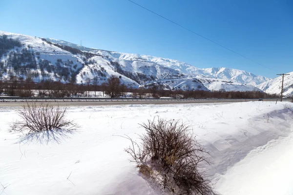 Snowy landscape from the train window