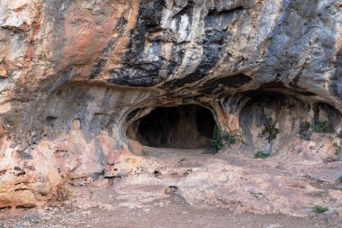 Karain Cave, Antalya, Turkey. Paleolithic archaeological site. Mediterranean region of Turkey. clipart