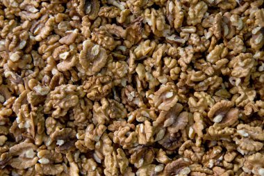 Bir arka plan doku olarak doğranmış ceviz parçaları