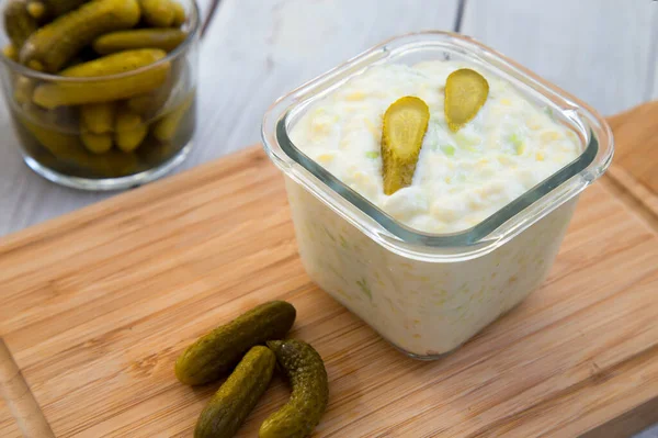 Homemade salad with yogurt, potato and cucumber