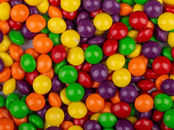Renkli Parlak Şeker Yığını Mor Sarı Kırmızı Yeşil Turuncu Şekerler — Stok fotoğraf