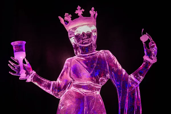 Pink sculpture of a queen with a crown made of ice, National Ice sculpture festival Zwolle, the Netherlands 2019-2020