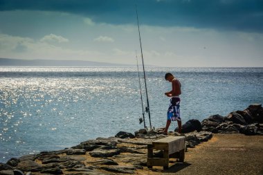 Kihei Sahili, Maui, Hawaii Adaları 'ndaki yerel balıkçı..
