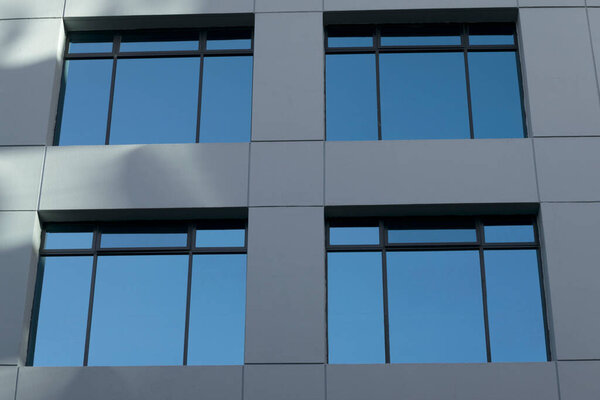 Exterior modern apartments building .Windows office building in latin america Guatemala.