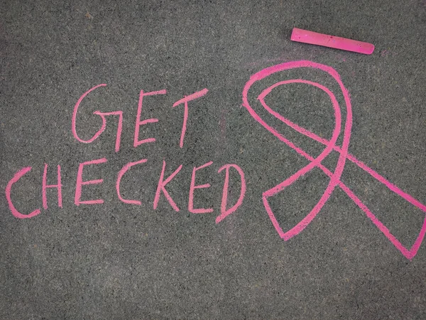 Chalk drawing of Breast Cancer Awareness Ribbon and inscription text \