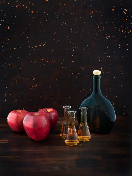 Aged Apple Brandy Calvados Red Apples Green Bottle Dark Wooden — Stock Photo, Image
