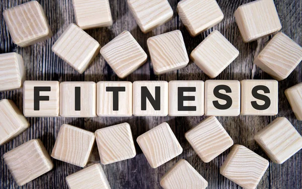 Fitness Medical Concept Text Wooden Cubes Many Cubes Dark Background — Stock Photo, Image