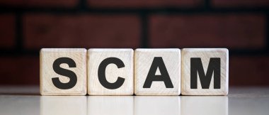 Dolandırıcılık konsepti tahta blok, iş konsepti.