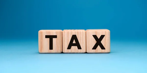 Slovní Kostka Tax Modrém Pozadí Obchodní Koncept — Stock fotografie