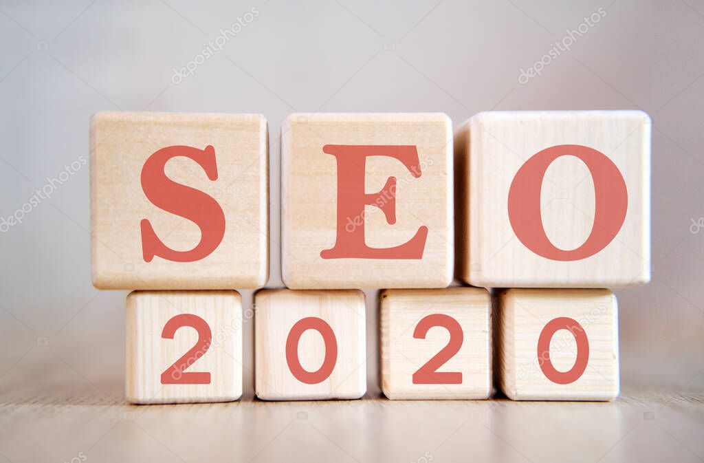 Seo 2020 concept. Wooden cubes on a black keyboard