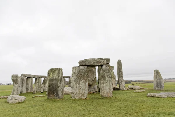 AMESBURY, GREAT BRITAIN - DEC 23, 2018: The stone monument Stonehenge a cloudy day, built in the late Neolithic period, around 2500 BC for unknown reason. December 23, 2018 in Amesbury, Great Britain
