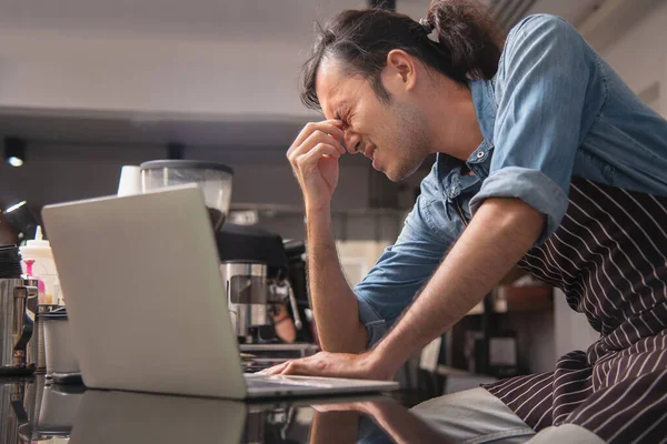 Young generation coffee shop owner have anxiety with his cafe  continuous negative sales