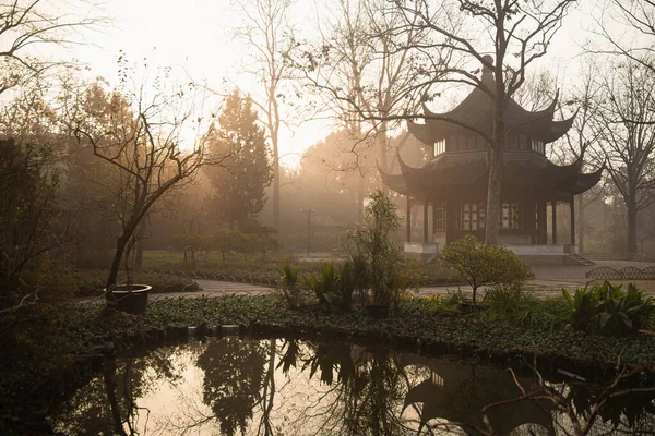 The Pagoda at Humble Administrator Garden(Zhuozheng Garden) in a mist early morning.Zhuozheng Garden a classical garden,a UNESCO World Heritage Site and is the most famous of the gardens of Suzhou.