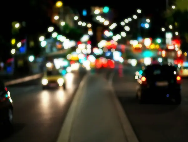 City lights.Night traffic and car lights bokeh of the city .