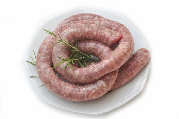 Raw Italian Long Pork Sausage Fresh Rosemary Branch Plate White — Stock Photo, Image