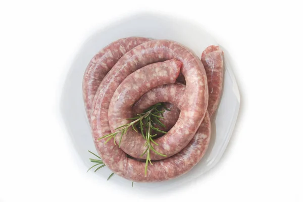 Raw Italian Long Pork Sausage Fresh Rosemary Branch Plate White — Stock Photo, Image