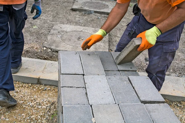 Two Masters Laying New Concrete Bricks Sidewalk Bricks Have Been — Stock Photo, Image