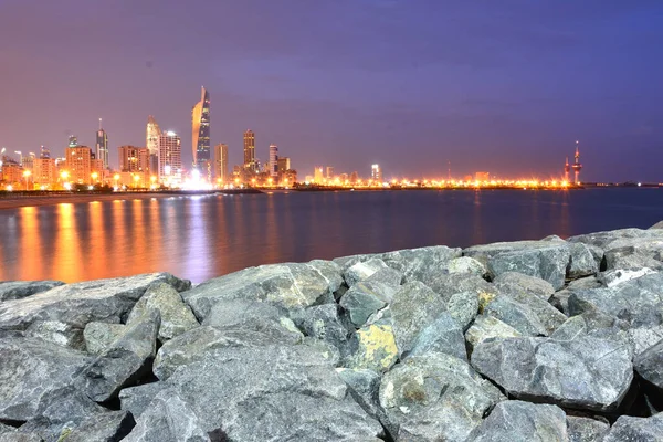 a vibrant city view with skyscrapers and sea shore taken from Alibaba beach in gulf street,Kuwait