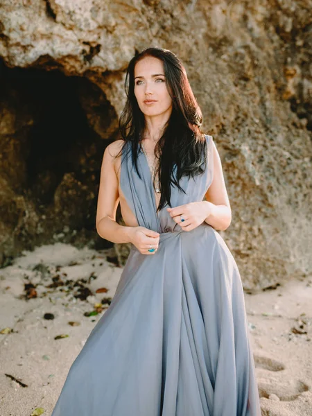 Portrait Beautiful Brunette Woman Long Grey Dress Sandy Beach Rocky — Stock Photo, Image