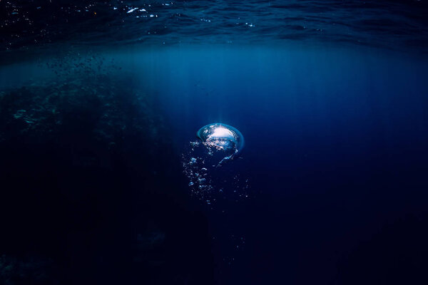 Underwater in ocean. Bubble in water. 