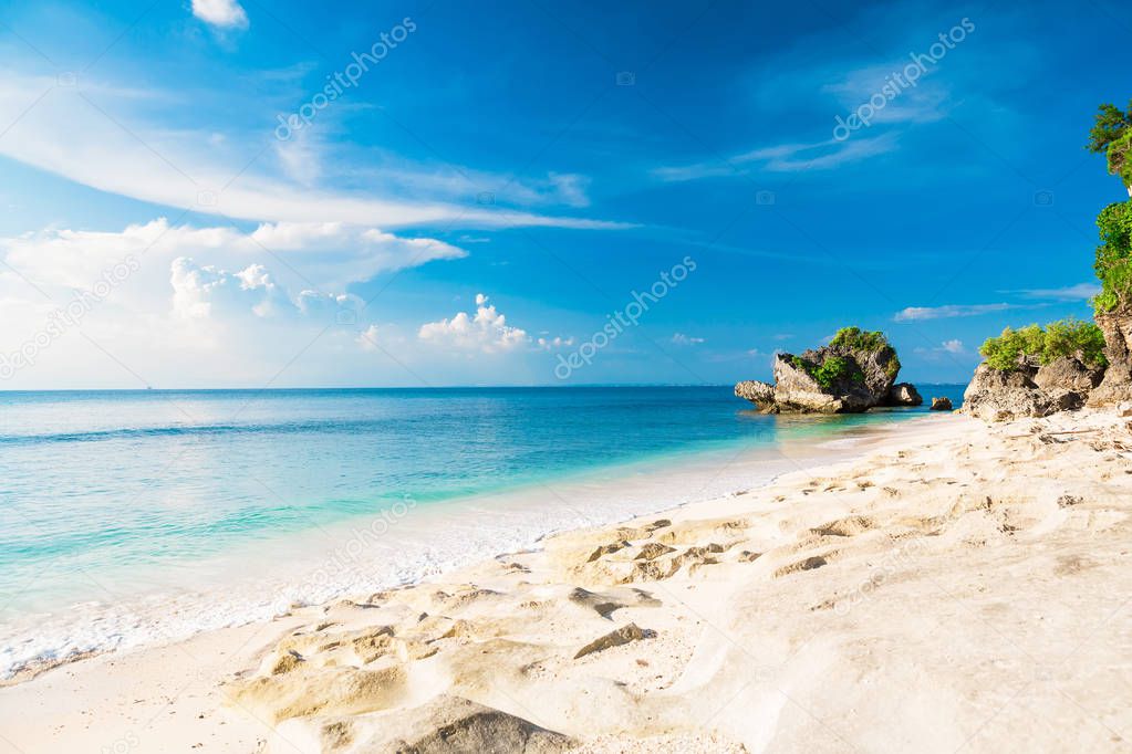 Tropical beach with blue ocean and blue sky in tropical island